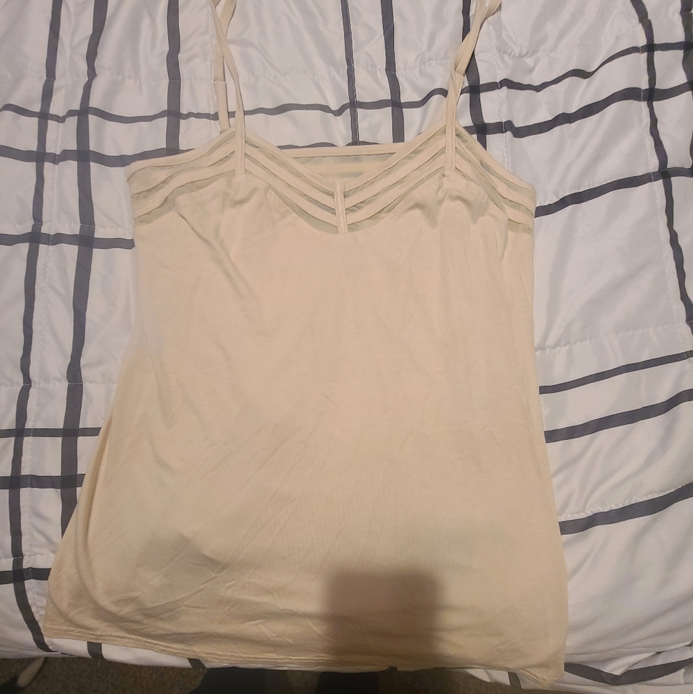 Tan colored tank top from The Buckle